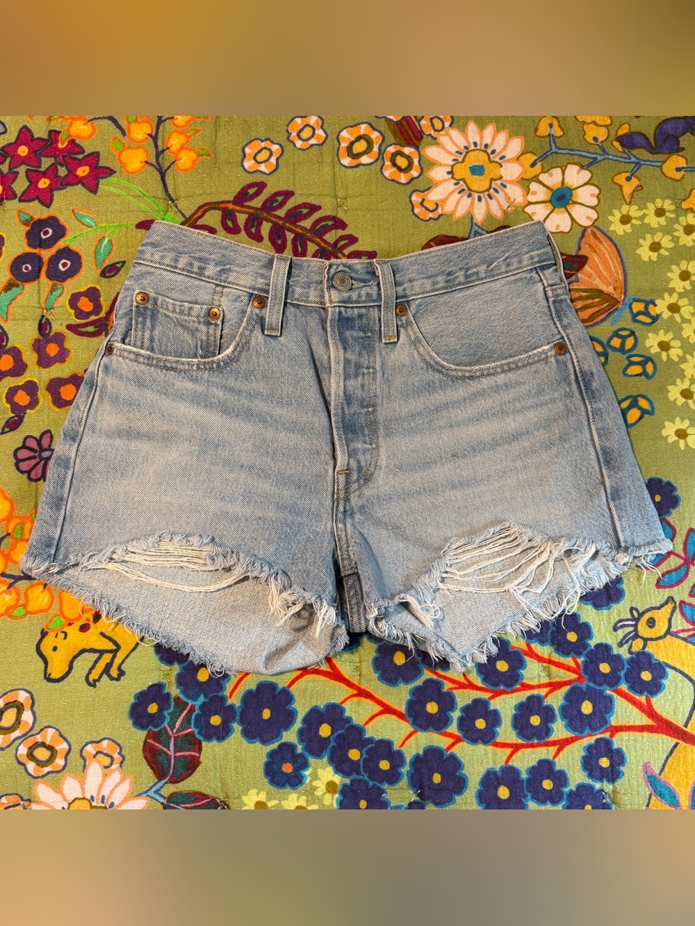 Levi’s 501 High-Rise Light Blue Distressed Denim Shorts